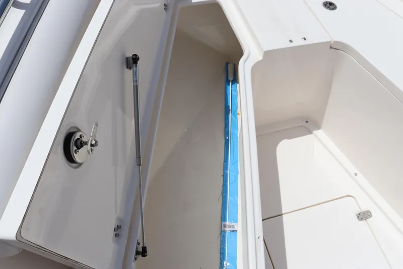 Slide: The Image of 2023 Sea Born SX239 Offshore boat storage compartment with hydraulic lift. - 32