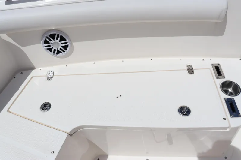 Slide: The Image of 2023 Sea Born SX239 Offshore boat deck with storage compartment and speaker. - 33