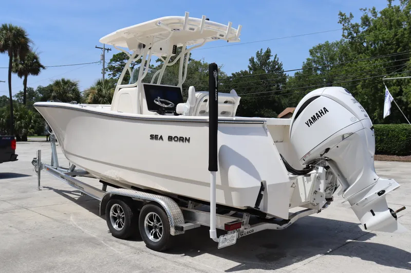 Slide: The Image of 2023 Sea Born SX239 Offshore boat on trailer with Yamaha outboard motor. - 5
