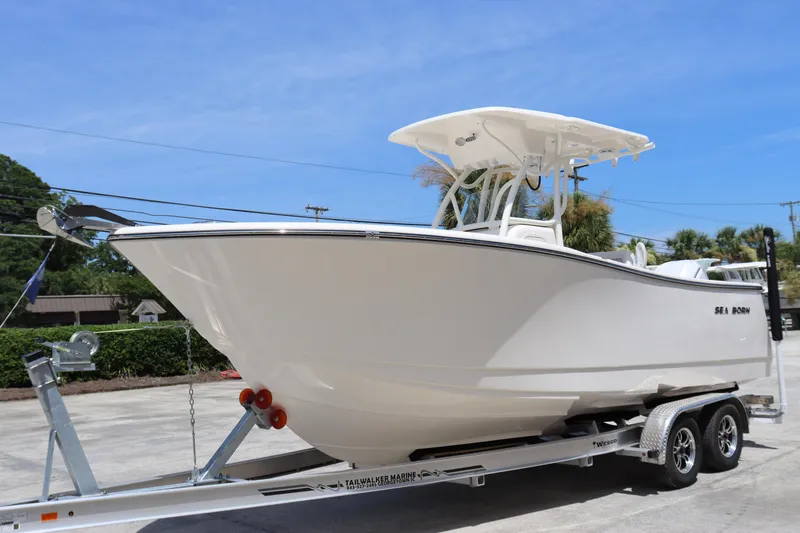 Slide: The Image of 2023 Sea Born SX239 Offshore boat on a trailer. - 6