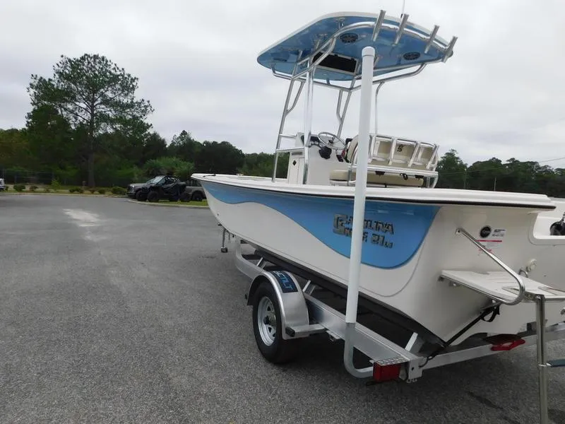 Slide: The Image of 2023 Carolina Skiff 21 LS boat on trailer, side view. - 2