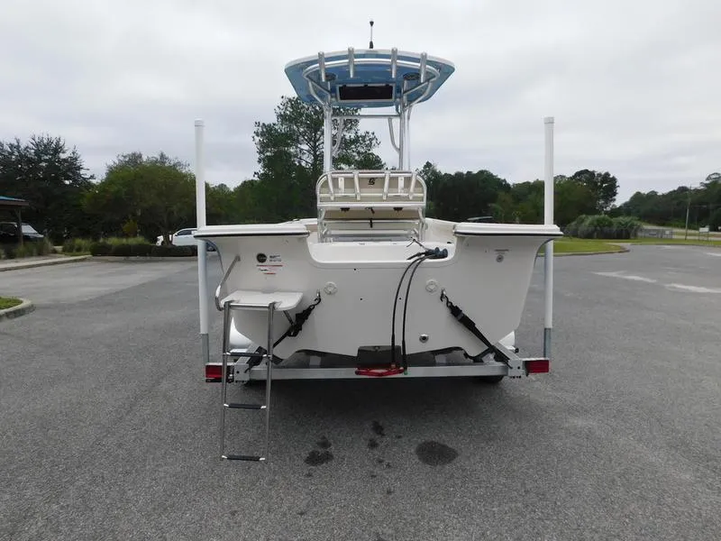 Slide: The Image of 2023 Carolina Skiff 21 LS boat rear view with ladder and T-top. - 5