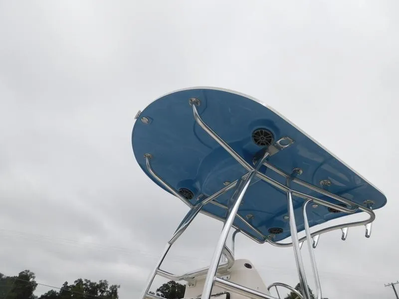 Slide: The Image of 2023 Carolina Skiff 21 LS boat with blue T-top and stainless steel frame. - 8