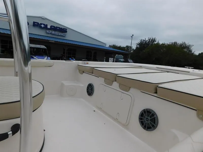 Slide: The Image of 2023 Carolina Skiff 21 LS boat interior with seating and storage compartments. - 9