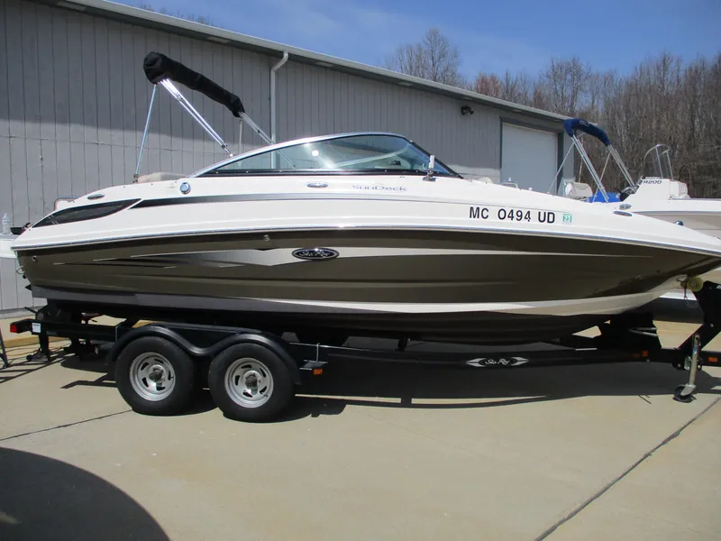 The Image of 2012 Sea Ray 220 Sundeck on trailer, side view. - 1