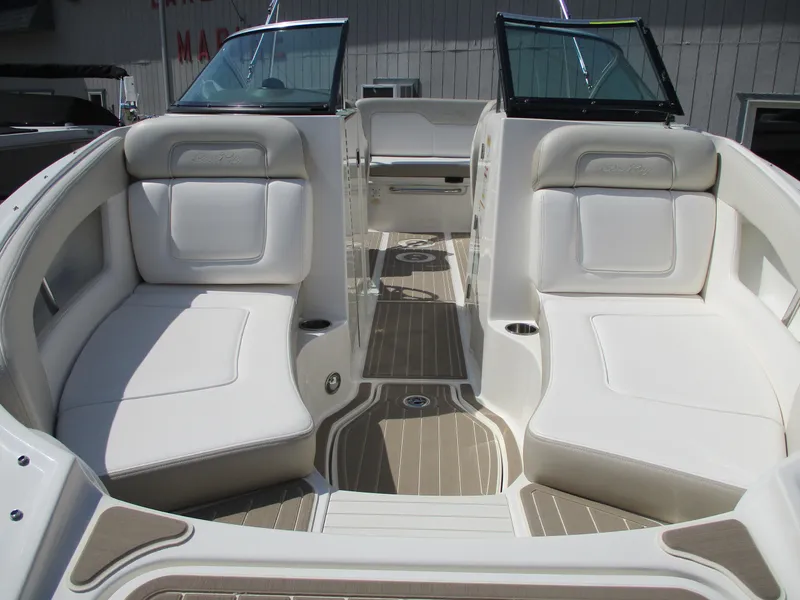Slide: The Image of Interior of a 2012 Sea Ray 220 Sundeck with white seating. - 5