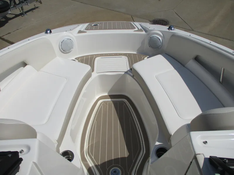 Slide: The Image of Interior of 2012 Sea Ray 220 Sundeck with white seating. - 6