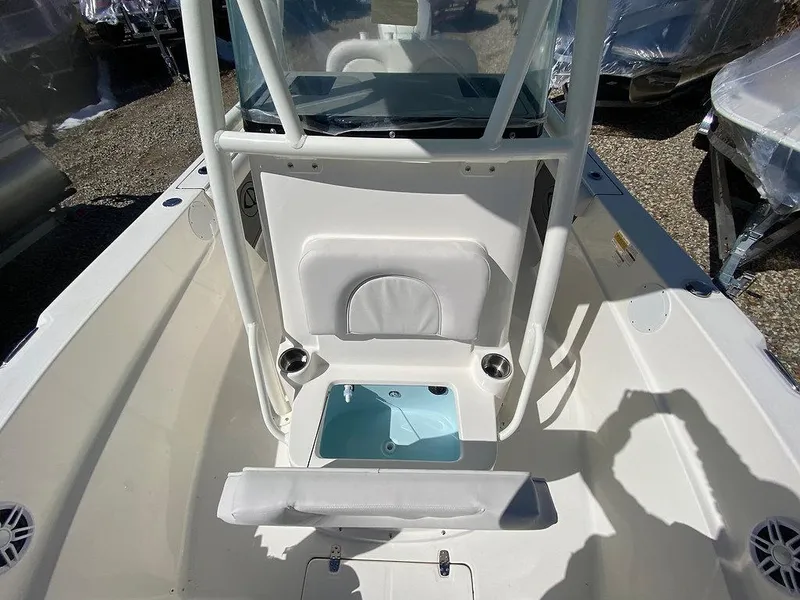 Slide: The Image of 2023 Sea Born LX 22 LE boat interior with seating and storage compartments. - 10