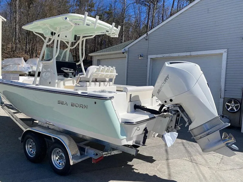 Slide: The Image of 2023 Sea Born LX 22 LE boat on trailer with outboard motor. - 3