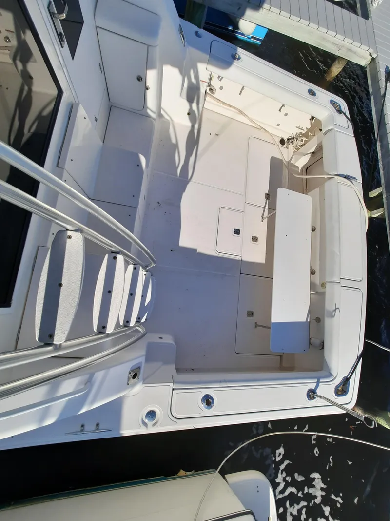 Slide: The Image of 2008 Tiara Yachts 3900 Convertible boat deck at dock. - 16