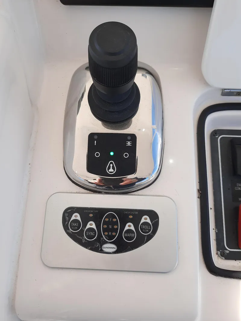 Slide: The Image of Joystick control panel on a 2008 Tiara Yachts 3900 Convertible. - 28