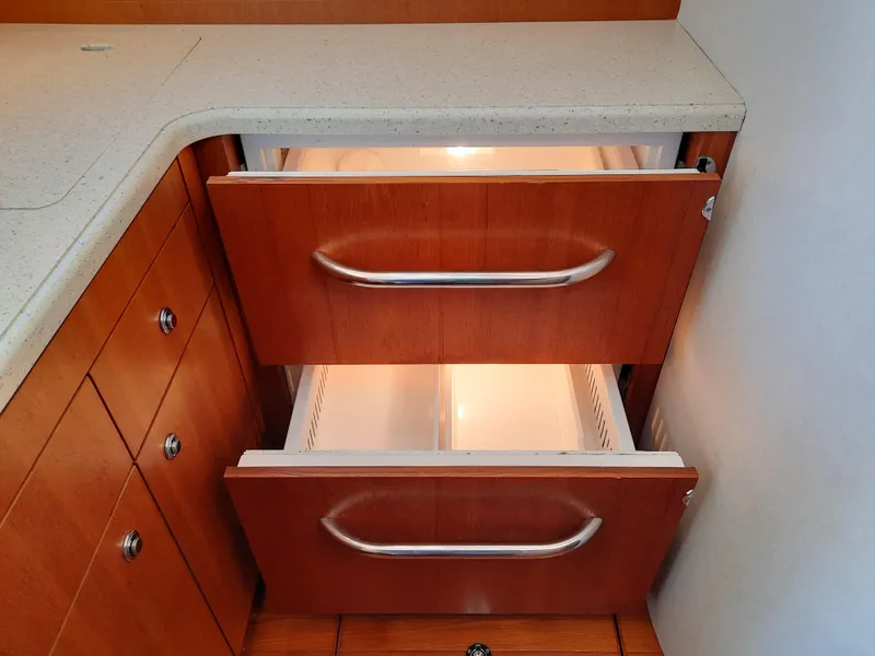 Slide: The Image of 2008 Tiara Yachts 3900 Convertible kitchen drawers with built-in refrigerator. - 48