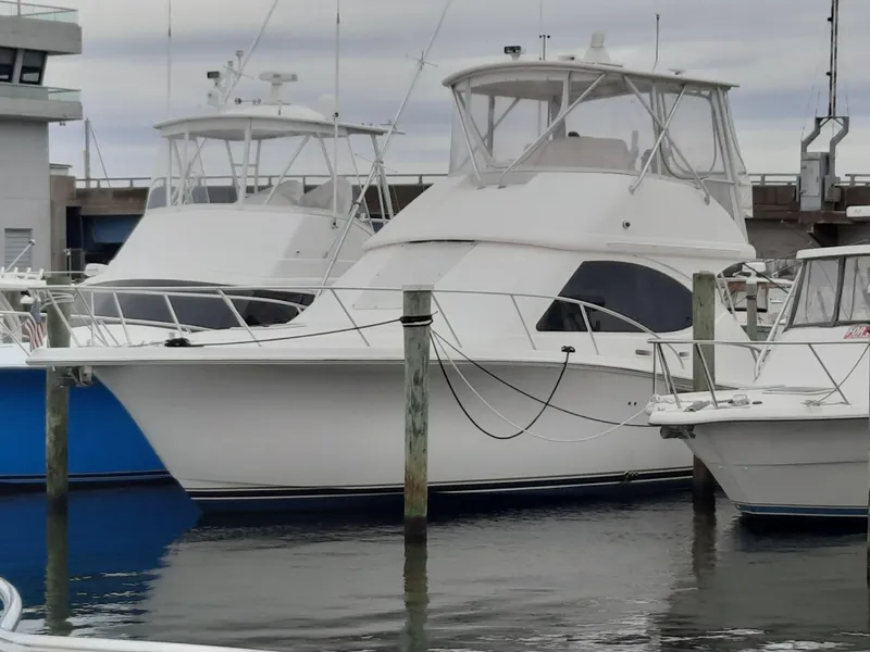 Slide: The Image of 2008 Tiara Yachts 3900 Convertible docked at marina. - 7