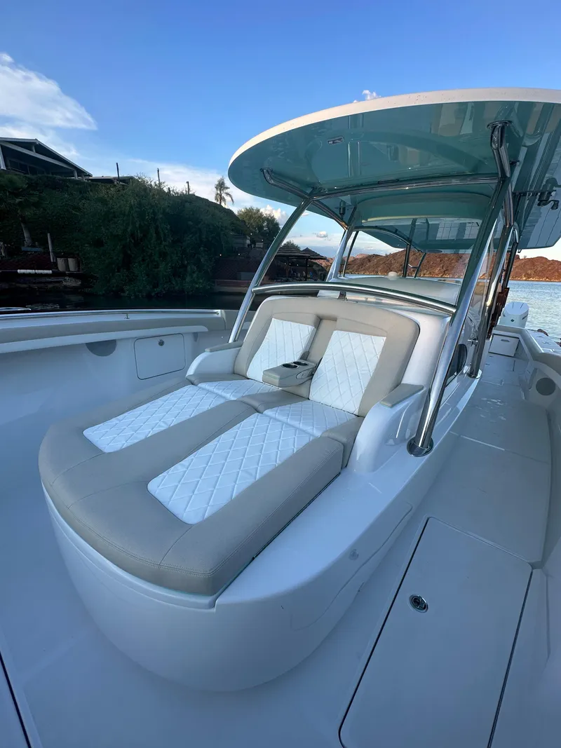 Slide: The Image of 2025 Mag Bay 43 Center Console with luxurious seating and sleek design. - 13