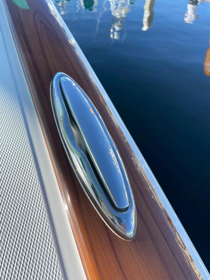 Slide: The Image of Close-up of 2025 Mag Bay 43 Center Console boat cleat. - 27