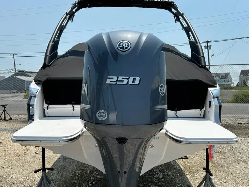 Slide: The Image of 2025 Regal LX4 boat with Yamaha 250 outboard motor, rear view. - 3
