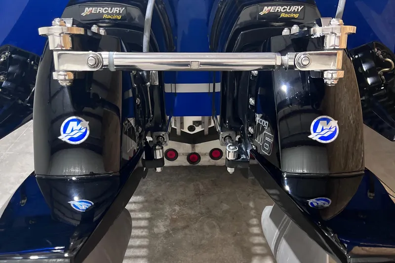 Slide: The Image of Twin Mercury Racing engines on a 1994 Apache 41 boat. - 6
