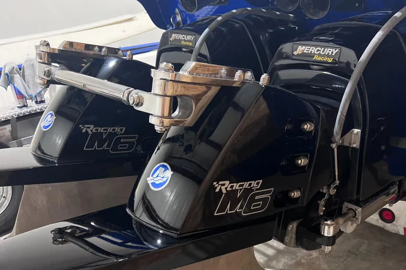 Slide: The Image of Close-up of Mercury Racing M6 outboard motors on a 1994 Apache 41 boat. - 7