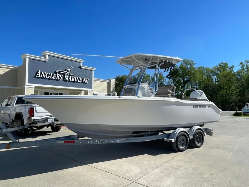 Slide: The Image of 2024 Key West 239 FS boat on trailer at Anglers Marine NC dealership. - 0