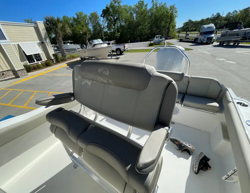 Slide: The Image of 2024 Key West 239 FS boat interior with seating and console. - 10