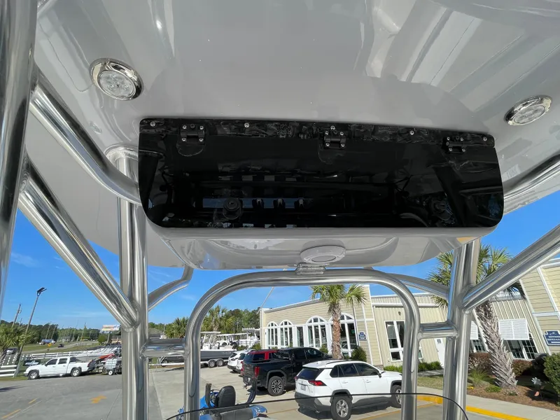 Slide: The Image of 2024 Key West 239 FS boat console with electronics and overhead view. - 20