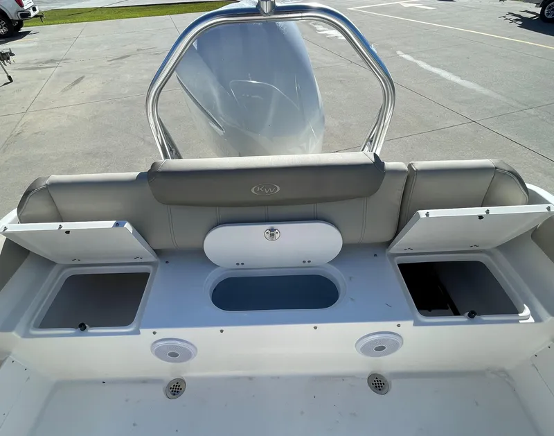 Slide: The Image of 2024 Key West 239 FS boat interior with storage compartments and seating. - 6