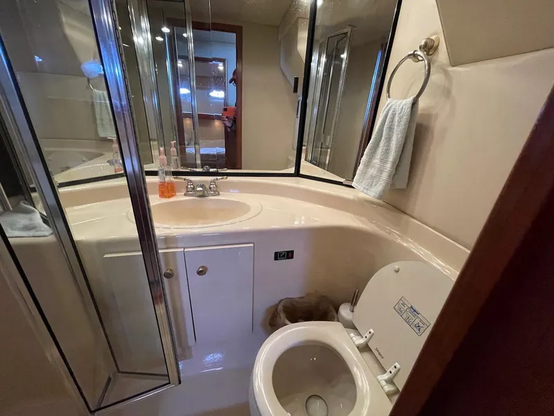 Slide: The Image of Bathroom interior of 2004 Meridian 490 Pilothouse yacht with sink and toilet. - 39
