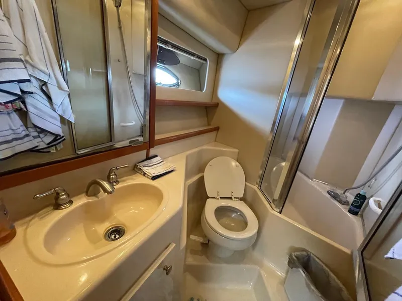Slide: The Image of Bathroom in 2004 Meridian 490 Pilothouse yacht with sink, toilet, and shower. - 45