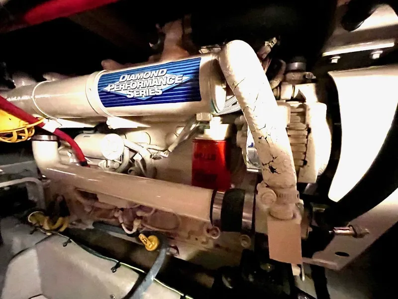 Slide: The Image of Engine of 2004 Meridian 490 Pilothouse, Diamond Performance Series label visible. - 46