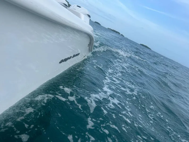 Slide: The Image of Cape Horn 34 XS boat navigating through ocean waves, 2022 model. - 1