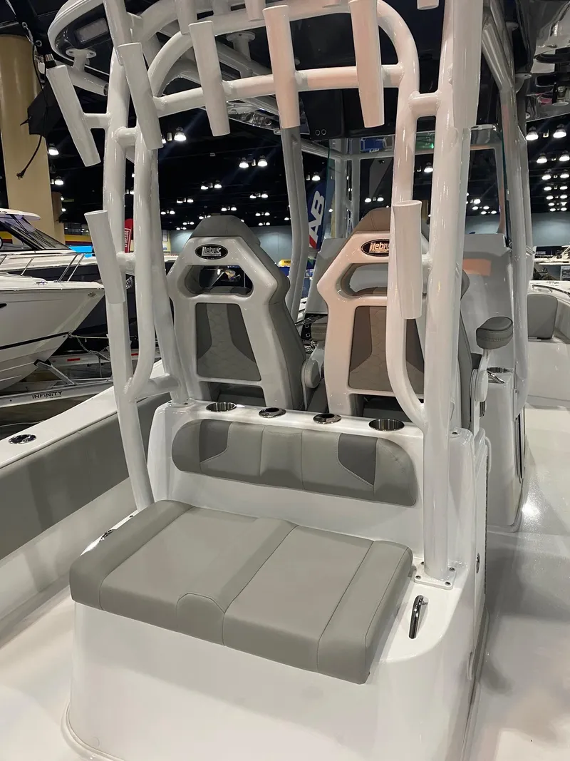Slide: The Image of 2022 Cape Horn 34 XS boat interior with dual seats and modern design. - 11