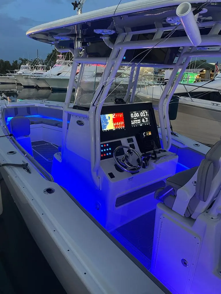 Slide: The Image of 2022 Cape Horn 34 XS boat with illuminated cockpit and advanced navigation system. - 4