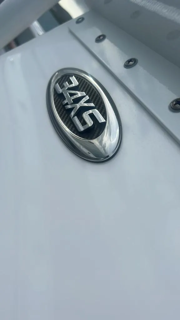 Slide: The Image of Cape Horn 34 XS 2022 boat emblem with sleek design and metallic finish. - 6