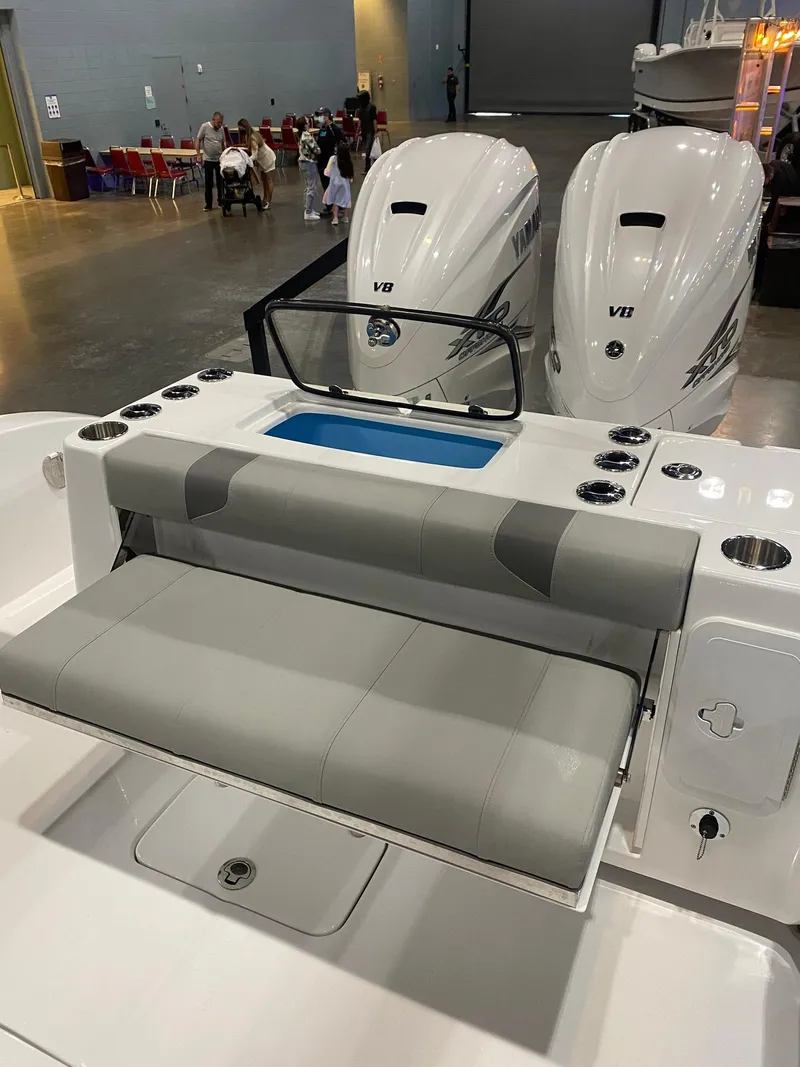Slide: The Image of 2022 Cape Horn 34 XS boat with dual V8 engines and cushioned seating. - 12