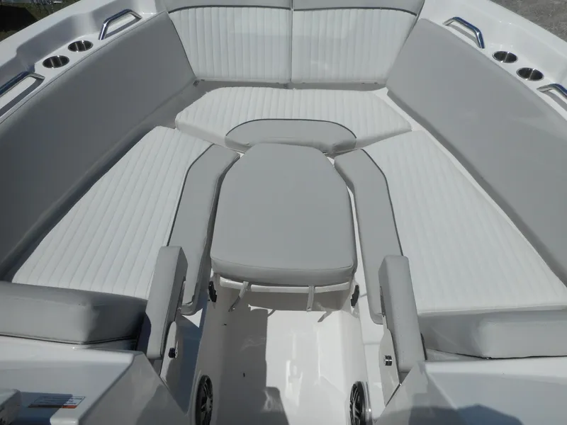 Slide: The Image of 2023 Sea Fox 268 Traveler boat interior seating area with white and gray upholstery. - 14