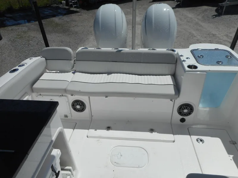 Slide: The Image of 2023 Sea Fox 268 Traveler boat interior with seating and twin outboard motors. - 21