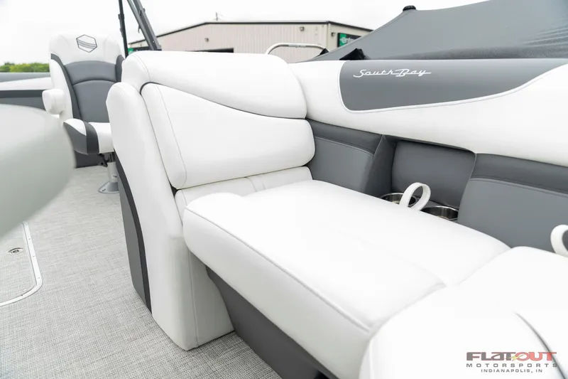 Slide: The Image of 2023 South Bay S224 Universal Lounge 200HP interior seating, white and gray upholstery. - 19