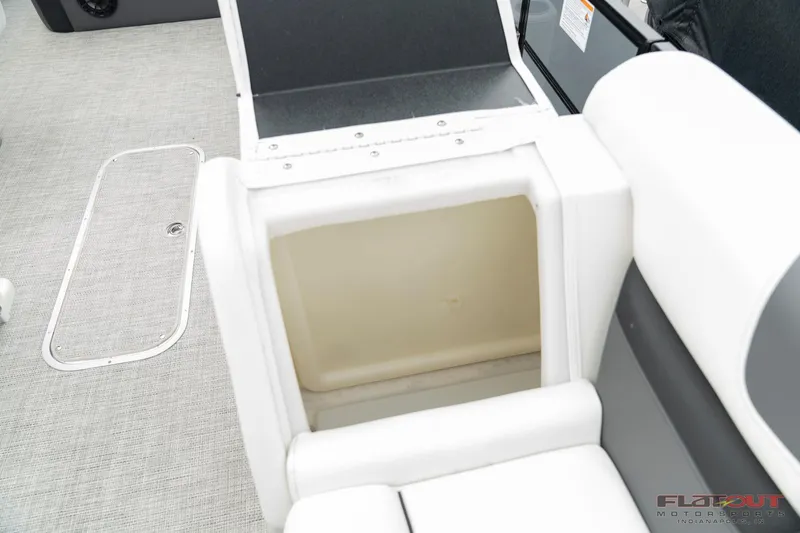 Slide: The Image of 2023 South Bay S224 Universal Lounge 200HP storage compartment with open lid. - 21
