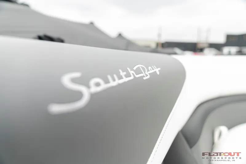 Slide: The Image of Close-up of 2023 South Bay S224 Universal Lounge 200HP boat interior. - 23