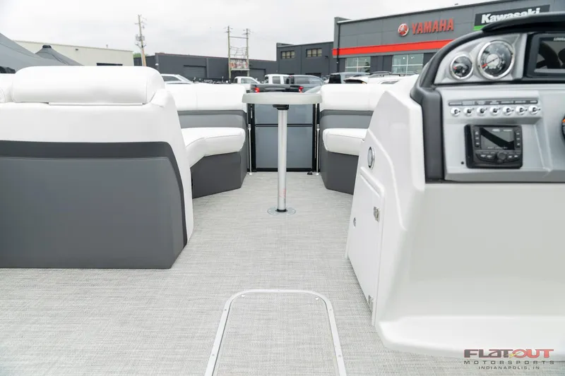 Slide: The Image of 2023 South Bay S224 Universal Lounge 200HP interior with modern dashboard and seating. - 24