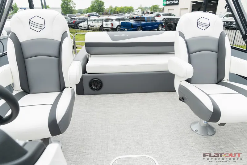 Slide: The Image of 2023 South Bay S224 Universal Lounge 200HP interior with plush seating. - 3