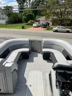 Slide: The Image of 2023 Vanderbilt 700T pontoon boat with spacious seating and modern design. - 16