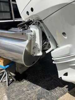 Slide: The Image of Close-up of a 2023 Vanderbilt 700T boat motor and propeller. - 23