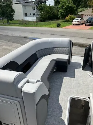 Slide: The Image of 2023 Vanderbilt 700T boat with spacious seating area and modern design. - 6