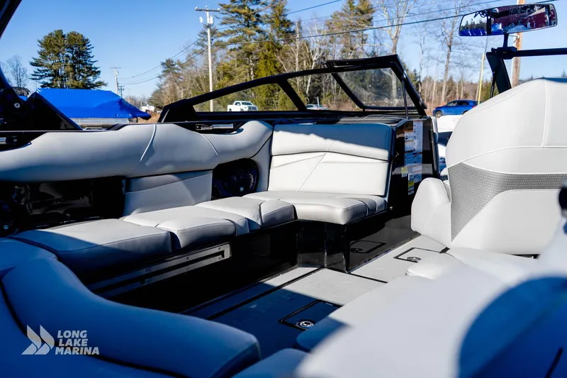 Slide: The Image of 2022 Centurion Fi23 boat interior with luxurious seating at Long Lake Marina. - 11