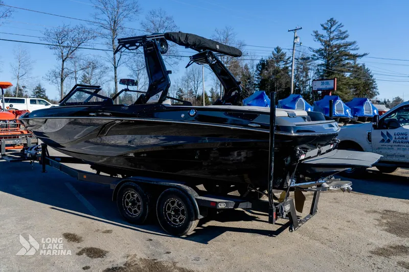 Slide: The Image of 2022 Centurion Fi23 boat on trailer at Long Lake Marina. - 13