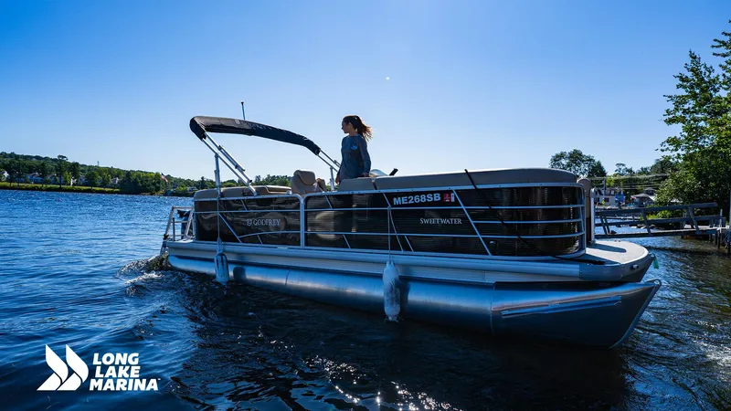 Slide: The Image of 2023 Godfrey Sw2286SB pontoon boat on a lake at Long Lake Marina. - 6
