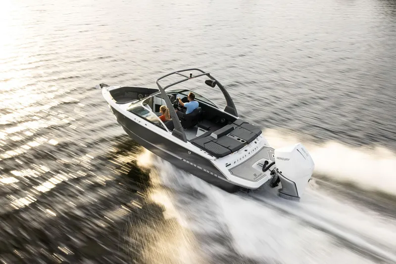 Slide: The Image of 2023 Four Winns H2 boat cruising on water. - 41