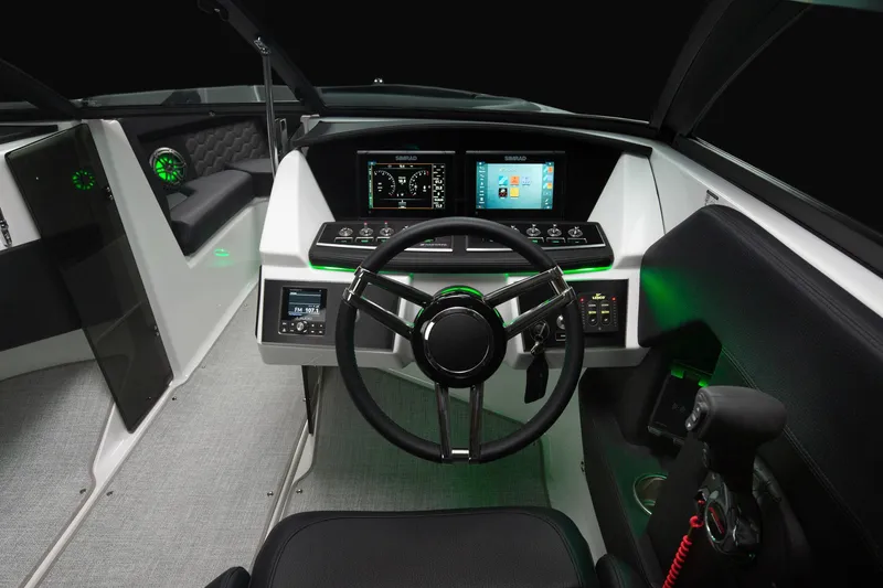 Slide: The Image of 2023 Four Winns H2 boat dashboard with modern controls and digital displays. - 47