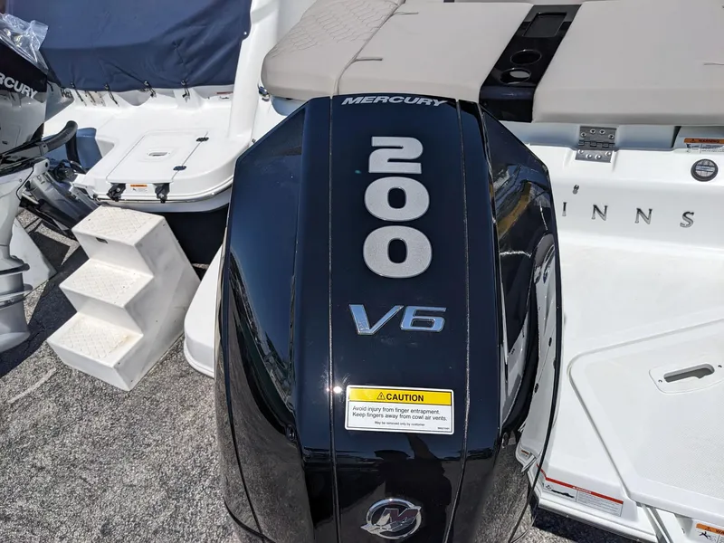 Slide: The Image of 2023 Four Winns H2 boat with Mercury 200 V6 outboard engine. - 5